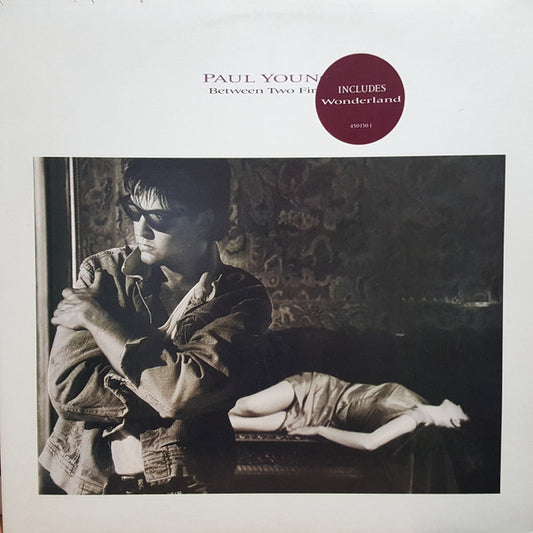 Paul Young – Between Two Fires